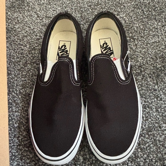 Vans Shoes - NEW size 8.5 W Vans Classic Slip-On Sneakers in Black/White